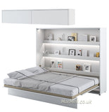 Wall bed open – White Matt front, mattress extended, shown with overhead cabinet and shelves