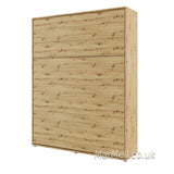 King size vertical wall bed with shelves – Oak Artisan finish, warm wood texture, closed position