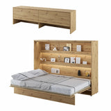 Open double horizontal wall bed in warm oak artisan finish with a matching overbed cabinet system and sturdy internal display shelves.