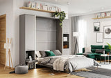 Open grey vertical wall bed in double size with side cabinets, displaying the heavy-duty spring opening system and convenient internal bedding straps