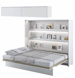 Open white matt horizontal king size wall bed unit shown with matching top storage cabinet, forming a complete minimalist wardrobe wall